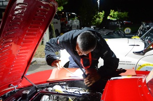 Mechanic working on OSCA MT4 late at night